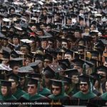 Graduating students attend their spring commencement ceremony at Ohio State University