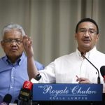 Hamzah Zainudin, left, Hishammuddin Hussein