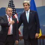 U.S. Secretary of State Kerry stands with Ukrainian Foreign Minister Deshchytsia before their meeting at the NATO headquarters in Brussels