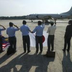 Miyagawa, Japanese ambassador to Malaysia, Jufuku, commander of Japan's Maritime Self-Defense Force and Royal Malaysian Air Force members wave to Japan Maritime Self-Defense Force P3C crew departing to Pearce Airbase at Subang Airbase