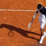 Djokovic reacts after missing a point during his match against Federer during their semi-final match at the Monte Carlo Masters in Monaco