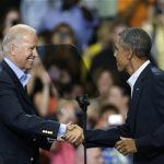 President Barack Obama, right, is greeted by Vice President Joe Biden