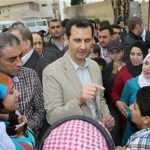Syrian President Bashar Assad, center