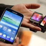 New Samsung Galaxy S5 smarphone, Gear 2 smartwatch and Gear Fit fitness band are displayed at the Mobile World Congress in Barcelona