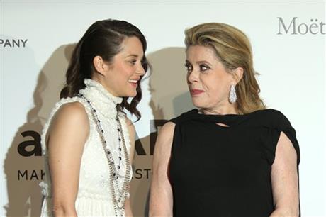 Actresses Marion Cotillard and Catherine Deneuve