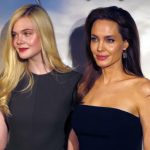 Actresses Angelina Jolie and Elle Fanning pose during a photocall for the film "Maleficent" in Paris