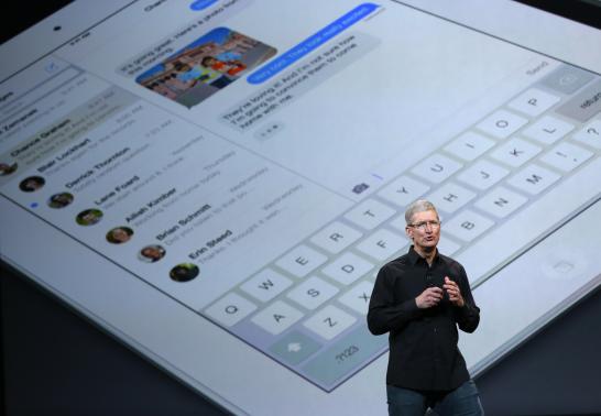 Apple Inc CEO Tim Cook speaks on stage about the new iPad during an Apple event in San Francisco