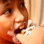 Child Eating Cake