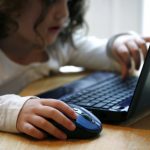 Child On Computer
