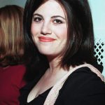 MONICA LEWINSKY AT THE NBA FASHION SHOW.