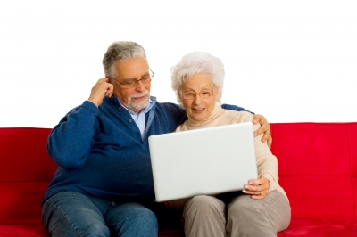 Elderly Couple With Laptop