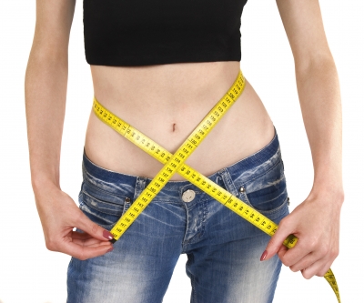 Lady Measuring Weight Loss - by sattva