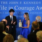 Lauren Bush Lauren accepts the 2014 Profile in Courage Award on behalf of her grandfather, former U.S. President George H. W. Bush, from Jack Schlossberg, grandson of former U.S. President John F. Kennedy, at the John F. Kennedy Library in Boston