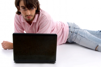 Lying Young Man With Laptop - by imagerymajestic