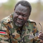 South Sudan's rebel leader Riek Machar speaks to rebel General Peter Gatdet Yaka in a rebel controlled territory in Jonglei State