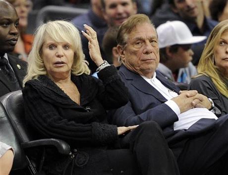 Shelly Sterling sits with her husband, Donald Sterling
