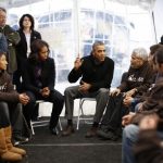 File photo of President Barack Obama and first lady Michelle Obama meeting with protesters fasting for immigration reform in a tent on the Washington Mall