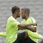 Brazil's Neymar, left front, and teammate Dani Alves