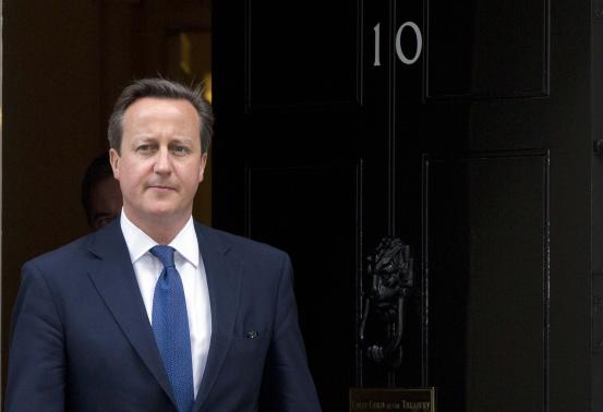 Britain's Prime Minister David Cameron leaves Downing Street to meet his Estonian counterpart Taavi Roivas in London
