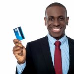 Businessman Showing His Credit Card