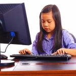 Child Working On Computer
