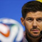 England's Steven Gerrard attends a news conference after a training session at the Corinthians arena at Sao Paulo city
