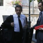 Former French President Nicolas Sarkozy arrives at the National Assembly in Paris