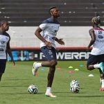 France's Paul Pogba, center, warms up during a training session at Santa Cruz stadium