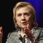 Clinton reacts to a question as she discusses her new book "Hard Choices" at George Washington University in Washington