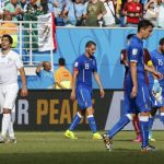 Uruguay's Suarez reacts after they won Italy in their 2014 World Cup Group D soccer match at the Dunas arena in Natal