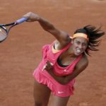 Keys of the U.S. serves the ball to Errani of Italy during their women's singles match at the French Open tennis tournament at the Roland Garros stadium in Paris
