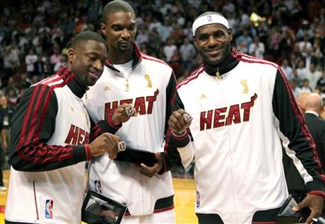 Miami Heat's Dwyane Wade, left, Chris Bosh, center, and LeBron James