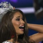 Miss Nevada Nia Sanchez reacts after winning the 2014 Miss USA beauty pageant in Baton Rouge, Louisiana