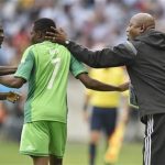 Nigeria's coach Stephen Keshi, right, and teammate Juwon Oshaniwa, left, congratulate Ahmed Musa