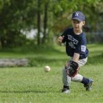 Owen Newcomer warms up before a Little League game in Williamsport