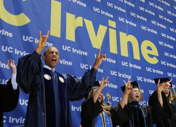 U.S. President Barack Obama yells to honor the school mascot during the commencement ceremony for the University of California, Irvine in Anaheim