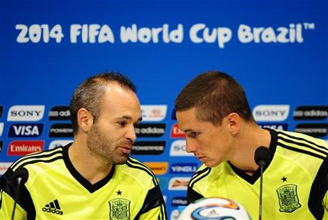 Spain's Andres Iniesta, left, and Fernando Torres