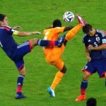 Yasuhito Endo (7) and Yuto Nagatomo, Didier Ya Konan