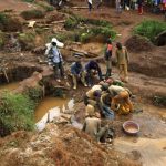 File photo of artisanal gold miners panning sediment for gold at an illegal mine-pit in Walungu territory of South Kivu province near Bukavu
