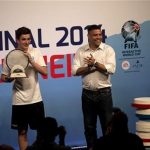 Denmark’s August Rosenmeier, left, winner of the FIFA Interactive World Cup 2014