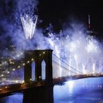 Fireworks light up the sky above the Brooklyn Bridge
