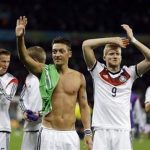Germany's Mesut Ozil, left, and teammate Andre Schuerrle (9)