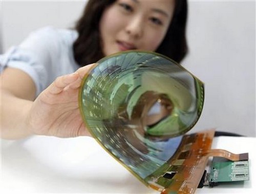 LG Display Co. an employee at the company demonstrates an 18-inch flexible display