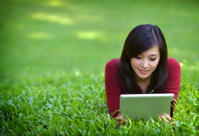 Pretty Woman Using Tablet