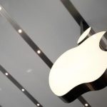 Apple logo is pictured inside the newly opened Omotesando Apple store at a shopping district in Tokyo