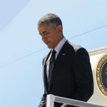 U.S. President Obama disembarks from Air Force One as he arrives at Los Angeles International Airport