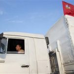 A white truck with humanitarian aid is driven from Voronezh towards Rostov-on-Don
