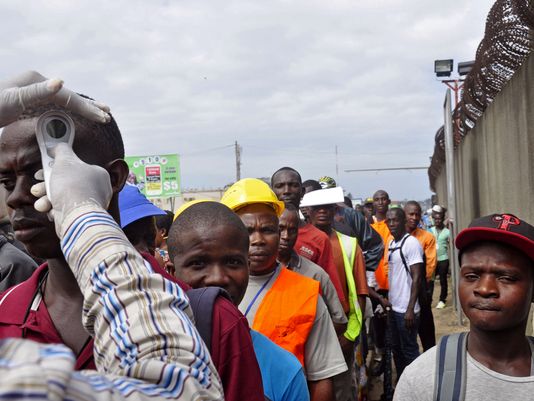 Ebola, Workers have their temperature taken