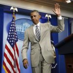 U.S. President Obama departs the White House Press Briefing Room after addressing reporters in Washington