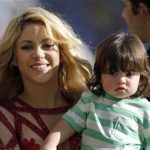 FILE - In this July 13, 2014 file photo, singer Shakira carries her son Milan after she performed during the closing ceremony prior to the World Cup final soccer match between Germany and Argentina at the Maracana Stadium in Rio de Janeiro, Brazil. The singer is pregnant with baby No. 2. Shakira made the announcement on her Facebook and Twitter pages on Thursday, Aug. 28, 2014. (AP Photo/Frank Augstein, file)